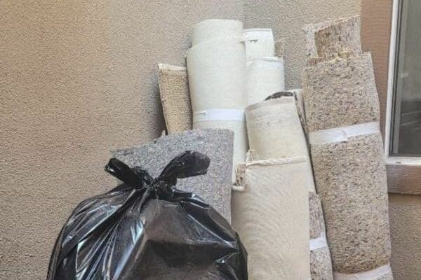 a pile of carpet rolls