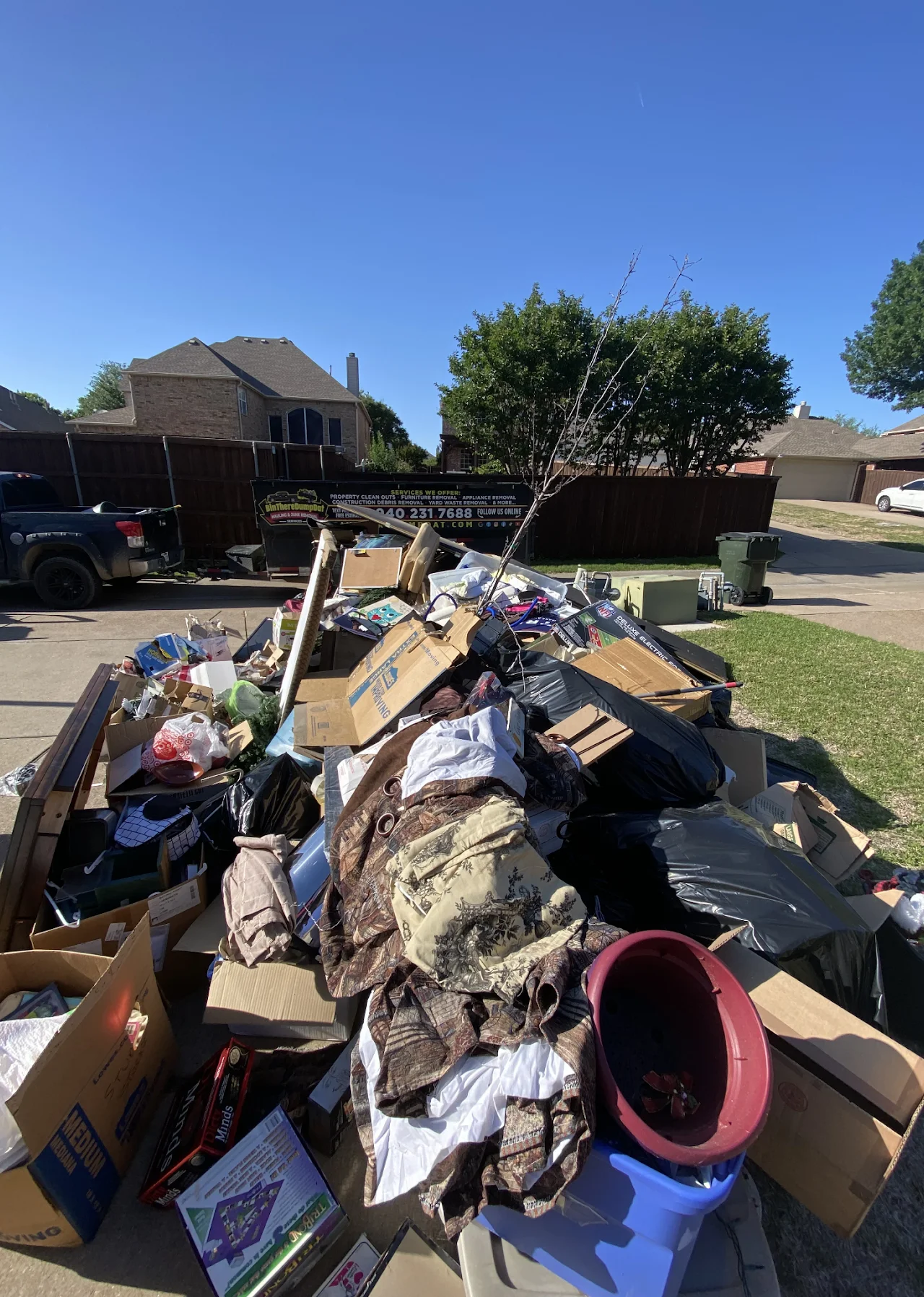 a pile of garbage in a yard